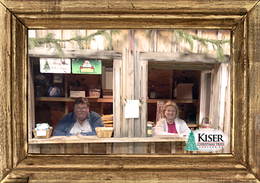 Our Christmas Market Checkout stand with members of our family waiting to assist you